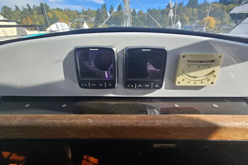 Soirse Yacht Photos Pics Control panel of 2013 Marlow-Hunter 50 aft cabin with Raymarine displays.