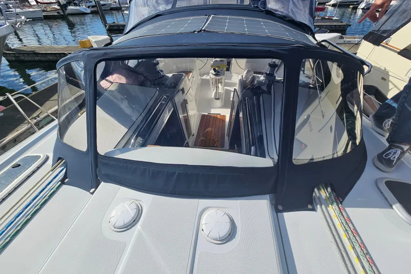 Soirse Yacht Photos Pics 2013 Marlow-Hunter 50 aft cabin sailboat with cockpit enclosure at marina.