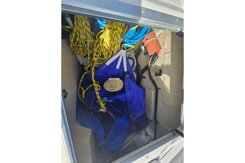 Soirse Yacht Photos Pics Storage compartment of 2013 Marlow-Hunter 50 aft cabin with ropes and equipment.