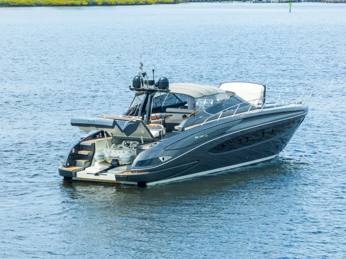 Wolverine Yacht Photos Pics 2015 Riva 63 Virtus luxury yacht on calm water.