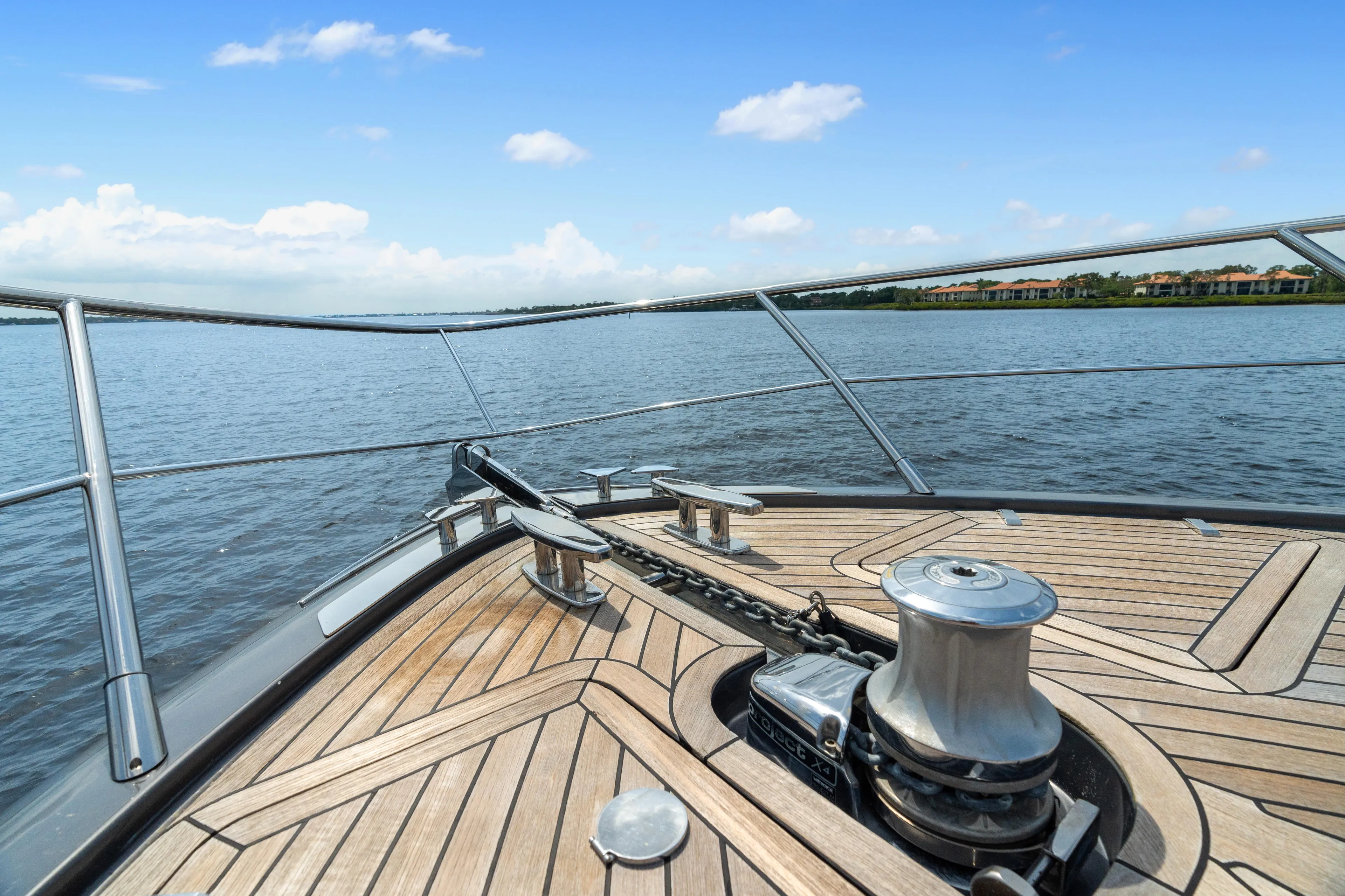 Wolverine Yacht Photos Pics Bow of 2015 Riva 63 Virtus yacht with teak decking and anchor chain.