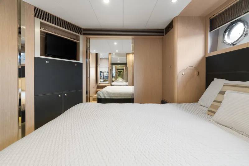 Wolverine Yacht Photos Pics Luxurious bedroom interior of 2015 Riva 63 Virtus yacht with modern design.