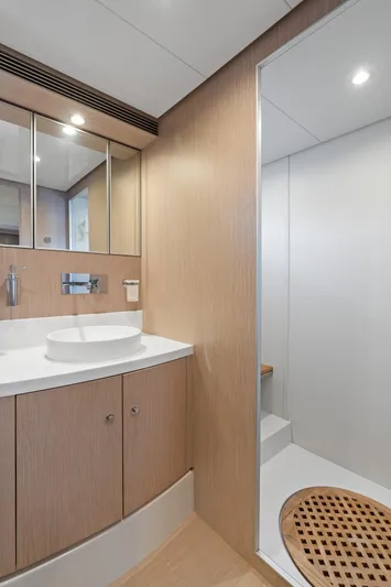 Wolverine Yacht Photos Pics Luxurious bathroom interior of 2015 Riva 63 Virtus yacht with modern fixtures.