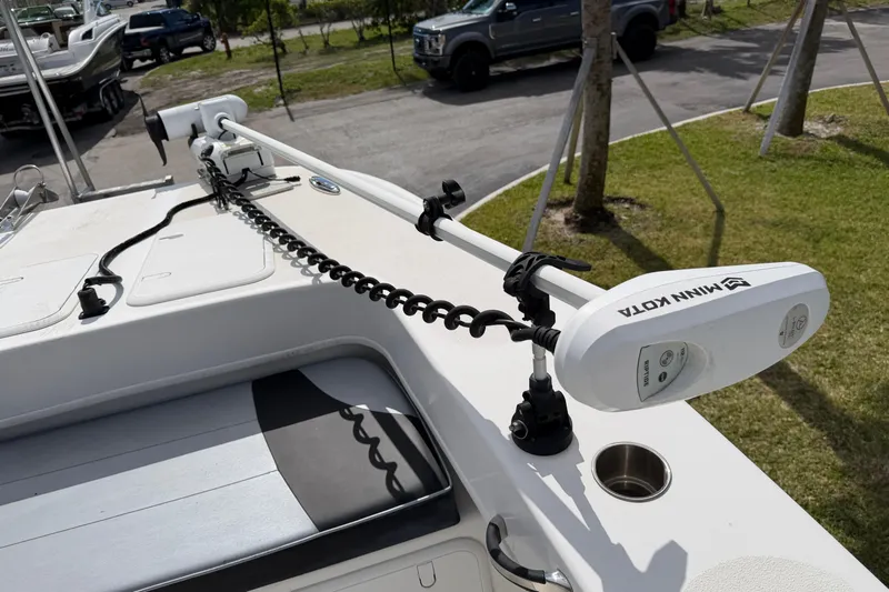  Yacht Photos Pics 2021 Twin Vee 310 CC GF boat with Minn Kota trolling motor on deck.