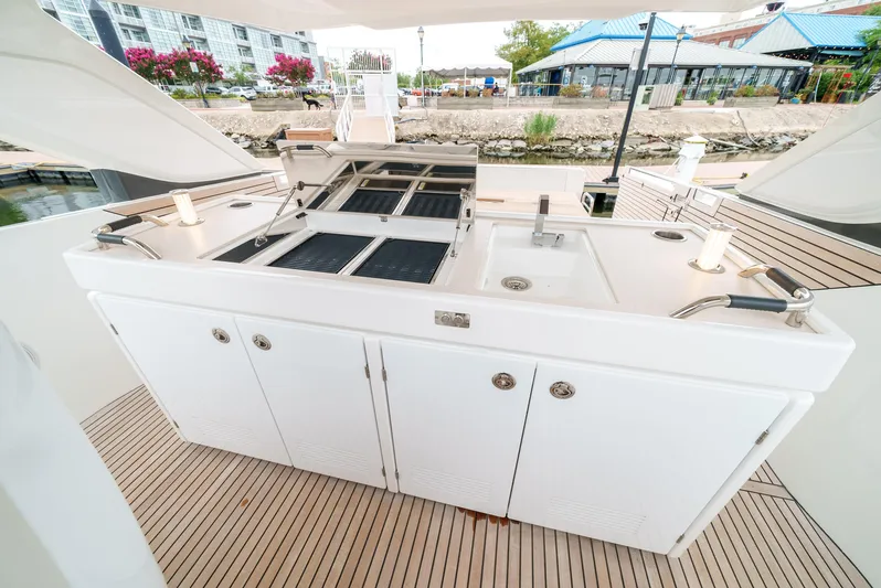  Yacht Photos Pics 2024 Jeanneau DB/43 OB yacht outdoor kitchen with grill and sink.