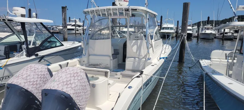Dos Suenos Yacht Photos Pics 2015 Century 30 boat docked at marina with twin engines.