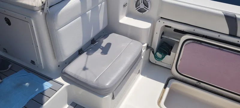 Dos Suenos Yacht Photos Pics Century 30 boat interior, featuring cushioned seating and storage compartments, 2015 model.