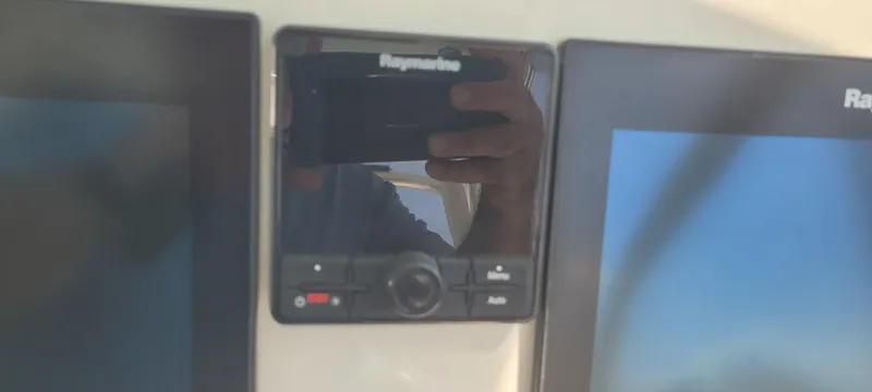 Dos Suenos Yacht Photos Pics Control panel of a 2015 Century 30 boat with navigation display.