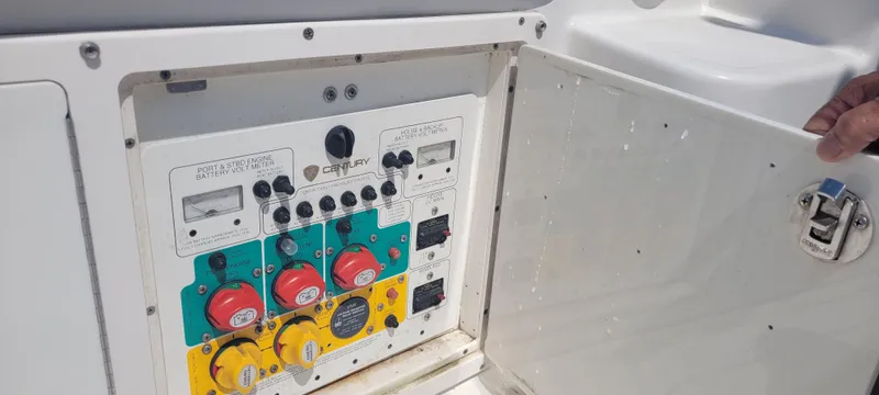 Dos Suenos Yacht Photos Pics Control panel of a 2015 Century 30 boat with battery switches and volt meters.