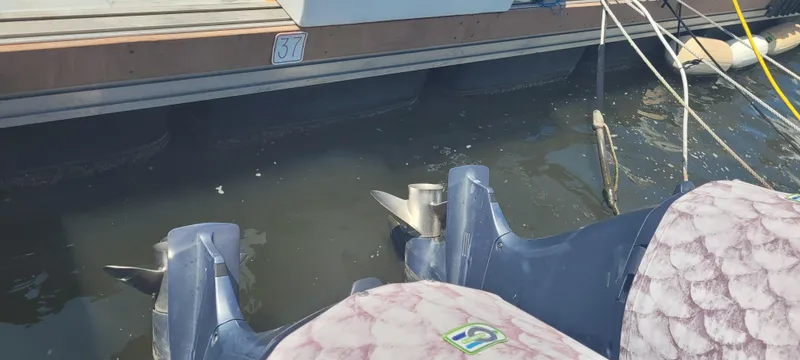 Dos Suenos Yacht Photos Pics Twin outboard motors on a 2015 Century 30 boat docked at slip 37.