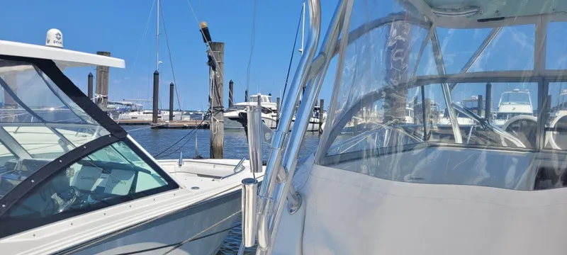 Dos Suenos Yacht Photos Pics Boats docked at a marina, featuring a 2015 Century 30 model.