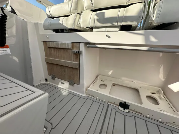  Yacht Photos Pics 2020 Regal 33 SAV boat interior with seating and storage compartments.