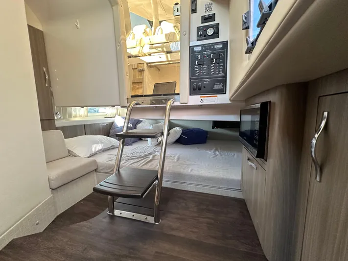  Yacht Photos Pics Interior of 2020 Regal 33 SAV boat with cozy seating and modern amenities.