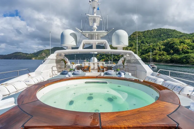 Oceanos Yacht Photos Pics Luxurious 2006 Mondomarine motor yacht with jacuzzi, scenic ocean and lush island backdrop.