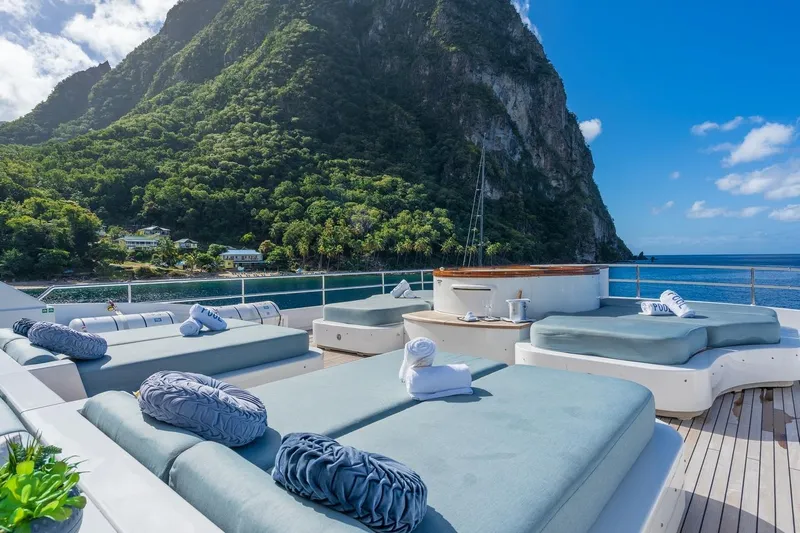 Oceanos Yacht Photos Pics Luxurious 2006 Mondomarine motor yacht deck with scenic mountain and ocean views.