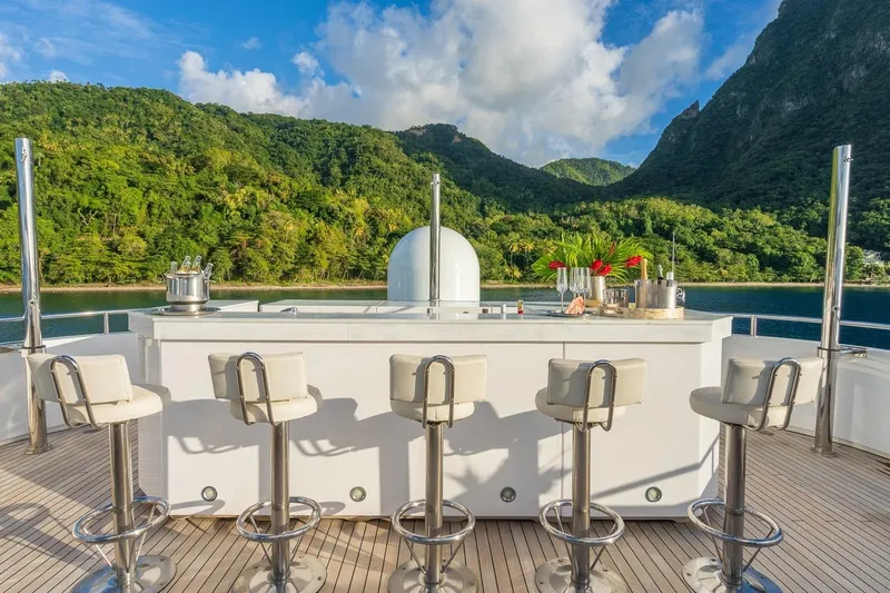 Oceanos Yacht Photos Pics Luxurious Mondomarine motor yacht bar with scenic mountain and ocean view, 2006 model.