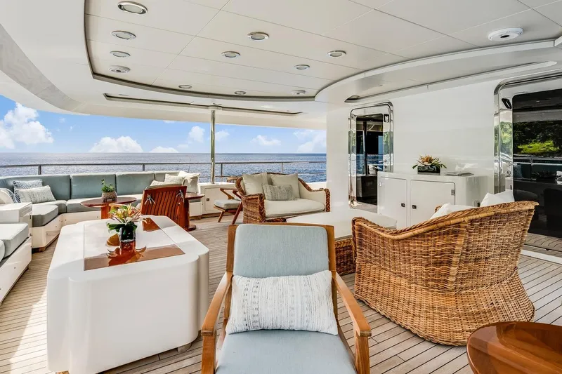 Oceanos Yacht Photos Pics Luxurious Mondomarine Motor Yacht 2006 deck with elegant seating and ocean view.