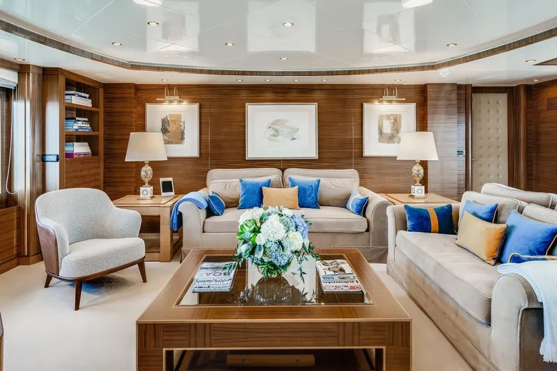 Oceanos Yacht Photos Pics Luxurious Mondomarine motor yacht interior, featuring elegant sofas, plush cushions, and stylish decor.