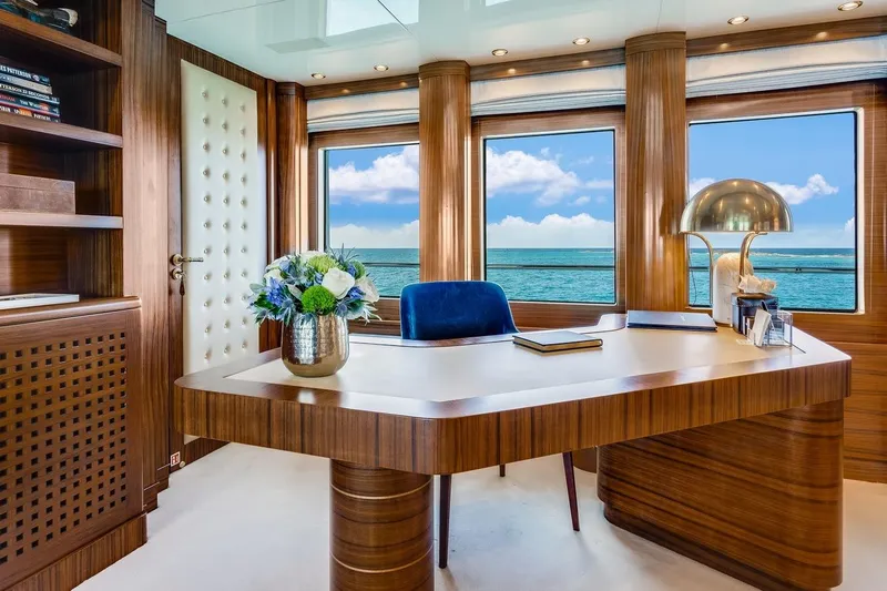 Oceanos Yacht Photos Pics Luxurious Mondomarine motor yacht office interior with ocean view, featuring elegant wood finishes, 2006 model.