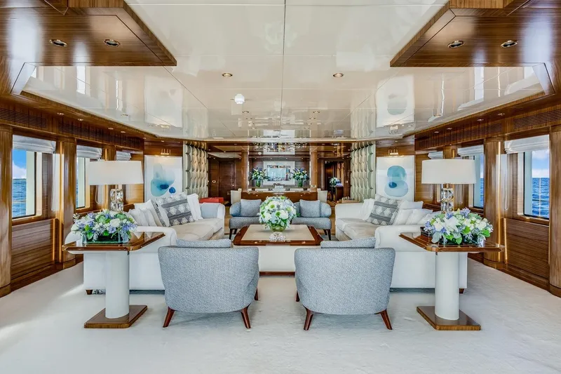 Oceanos Yacht Photos Pics Luxurious 2006 Mondomarine motor yacht interior with elegant seating and floral arrangements.