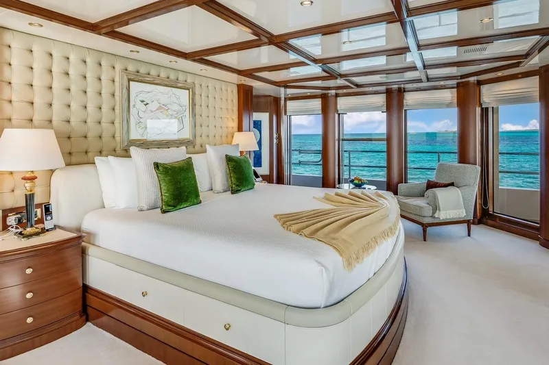 Oceanos Yacht Photos Pics Luxurious Mondomarine motor yacht bedroom with ocean view, elegant decor, and plush furnishings.