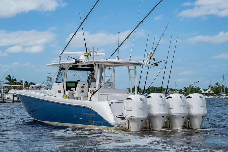Riptide Yacht Photos Pics 2018 Everglades 435 Center Console boat with multiple outboard engines on the water.