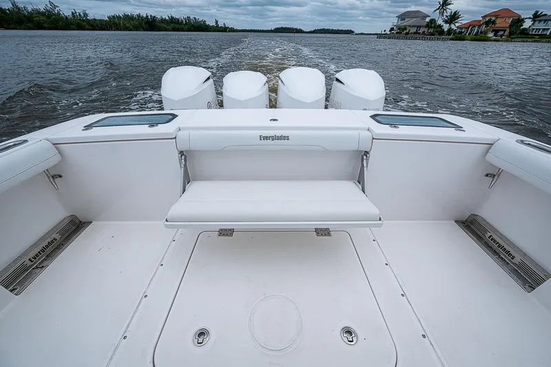 Riptide Yacht Photos Pics 2018 Everglades 435 Center Console boat with quad engines on a calm waterway.