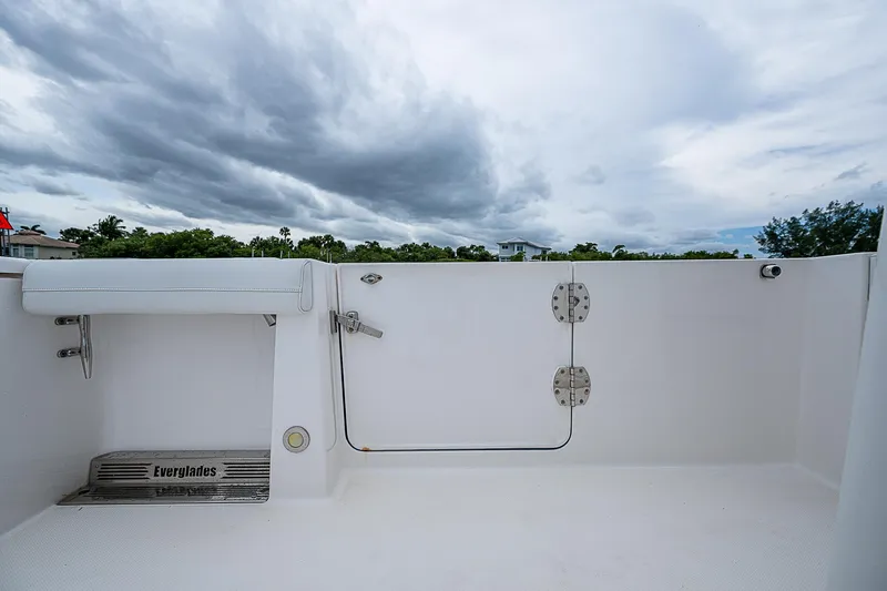Riptide Yacht Photos Pics 2018 Everglades 435 Center Console boat deck under cloudy sky.