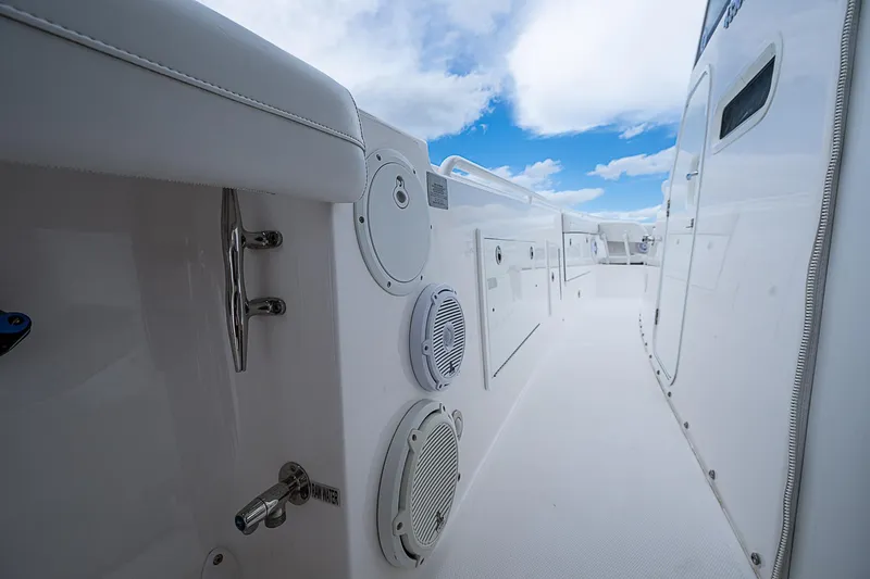 Riptide Yacht Photos Pics 2018 Everglades 435 Center Console boat deck with clear blue sky.