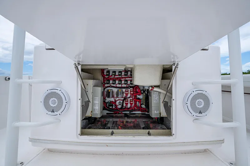 Riptide Yacht Photos Pics Electrical panel of 2018 Everglades 435 Center Console boat with wiring and speakers.