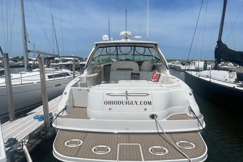  Yacht Photos Pics 2001 Sea Ray 460 Sundancer yacht docked at marina, rear view with website URL displayed.