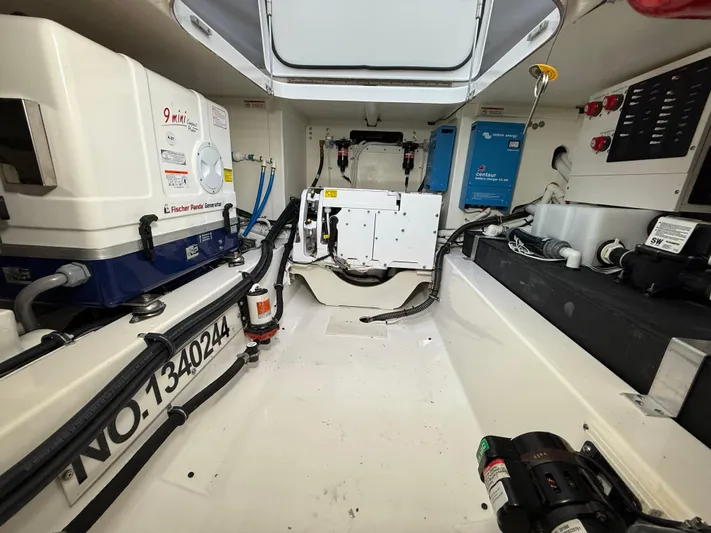  Yacht Photos Pics Engine room of 2023 Tiara Yachts 43 LS, featuring equipment and wiring.