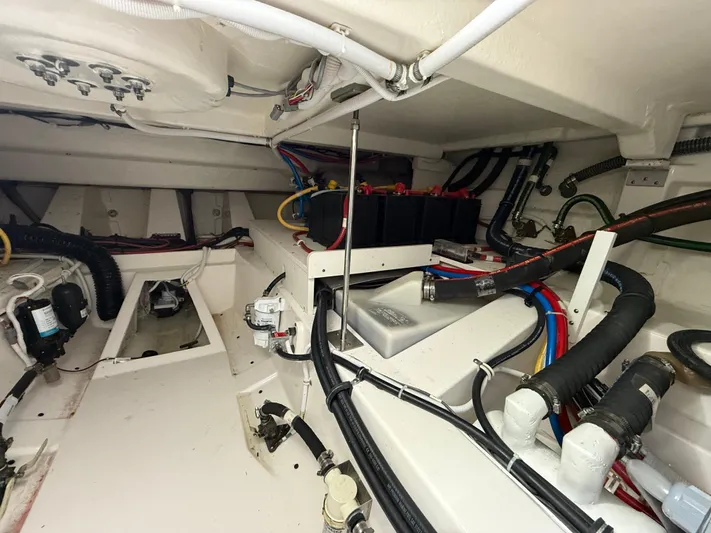  Yacht Photos Pics Engine compartment of 2023 Tiara Yachts 43 LS, showcasing wiring and components.