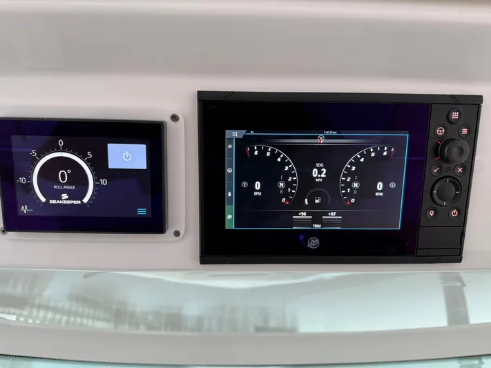  Yacht Photos Pics Dashboard of 2023 Tiara Yachts 43 LS with digital displays and controls.