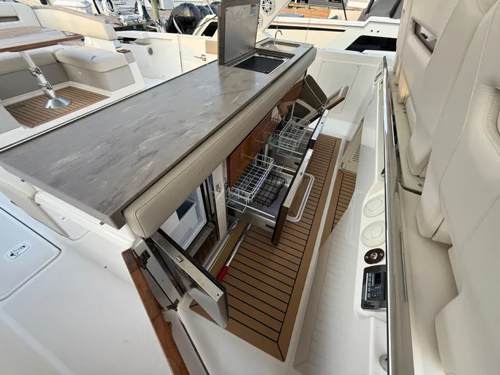 Yacht Photos Pics 2023 Tiara Yachts 43 LS interior with sleek kitchen and modern amenities.