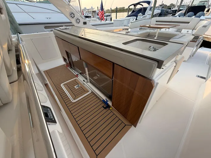 Yacht Photos Pics 2023 Tiara Yachts 43 LS luxury yacht deck with sleek design and modern amenities.