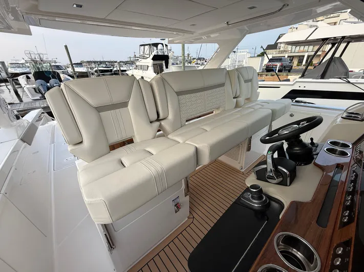  Yacht Photos Pics 2023 Tiara Yachts 43 LS interior with luxurious seating and modern helm controls.