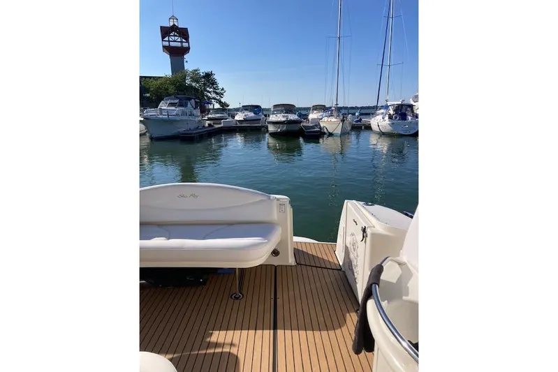 Lyman Zerga Yacht Photos Pics 2001 Sea Ray 380 Sundancer docked at marina with other boats.