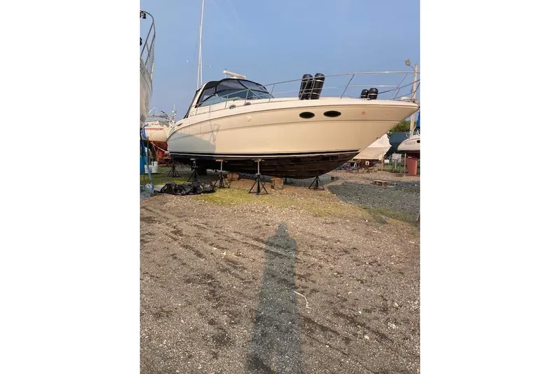 Lyman Zerga Yacht Photos Pics 2001 Sea Ray 380 Sundancer yacht on dry dock, side view.