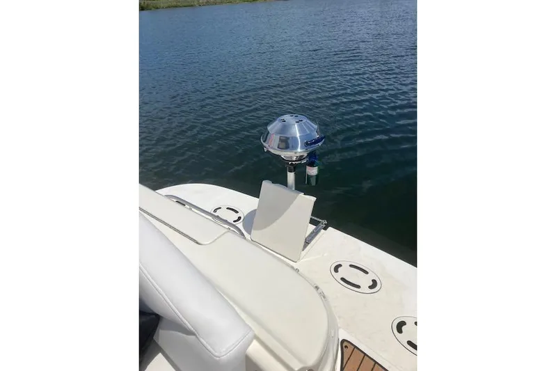 Lyman Zerga Yacht Photos Pics 2001 Sea Ray 380 Sundancer boat with a mounted grill on deck by the water.