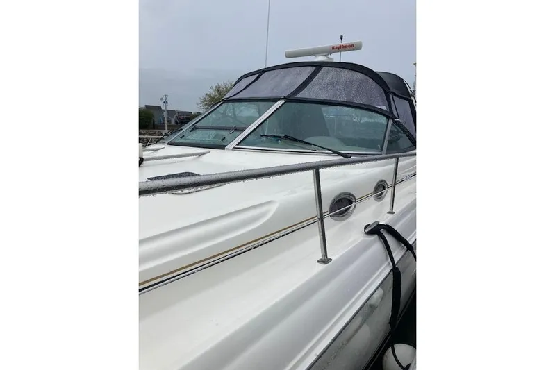 Lyman Zerga Yacht Photos Pics 2001 Sea Ray 380 Sundancer boat with sleek design and covered cockpit.