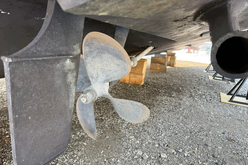 Lyman Zerga Yacht Photos Pics Propeller and rudder of a 2001 Sea Ray 380 Sundancer on dry dock.