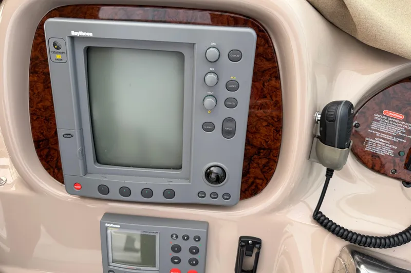 Lyman Zerga Yacht Photos Pics Control panel of a 2001 Sea Ray 380 Sundancer boat with navigation equipment.