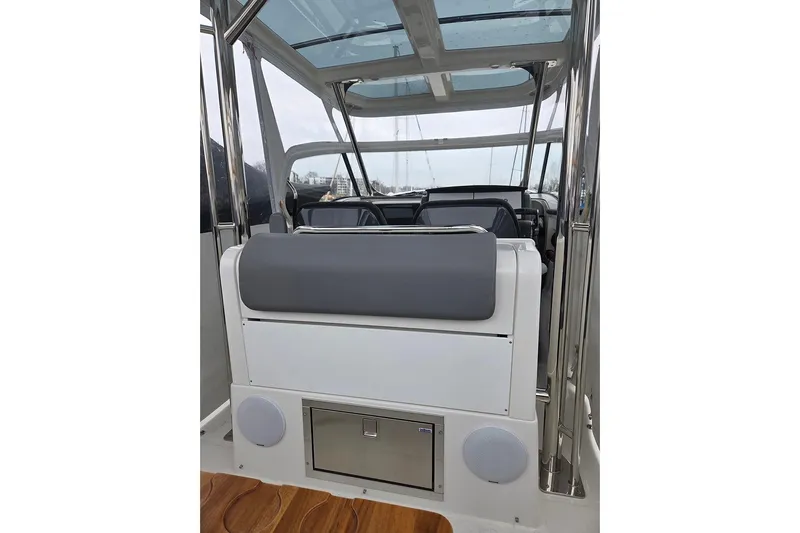 Ann #121 Yacht Photos Pics Interior view of 2023 Nimbus T9 boat with modern seating and sleek design.