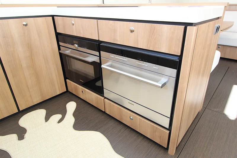  Yacht Photos Pics Modern kitchen appliances in 2024 Linssen 55 SL AC Variotop yacht interior.