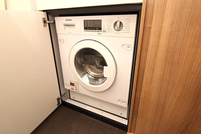  Yacht Photos Pics Built-in Siemens washing machine on Linssen 55 SL AC Variotop yacht, 2024 model.