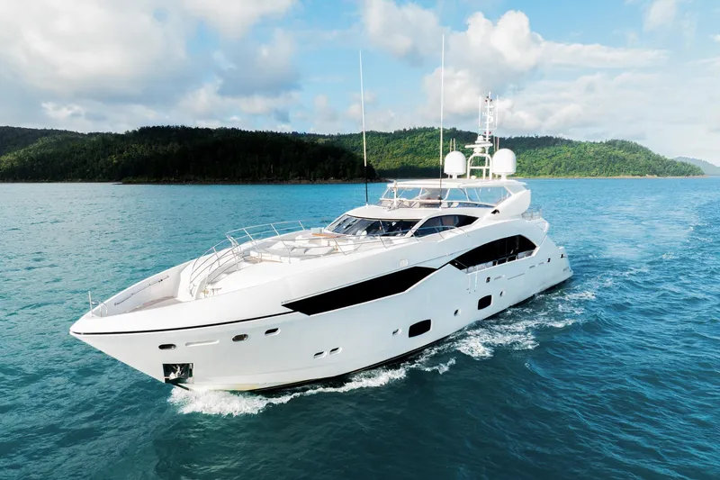 2015 Sunseeker 115' Sport Yacht Yacht Photos Pics Luxurious 2015 Sunseeker 115 Sport Yacht cruising in clear blue waters.