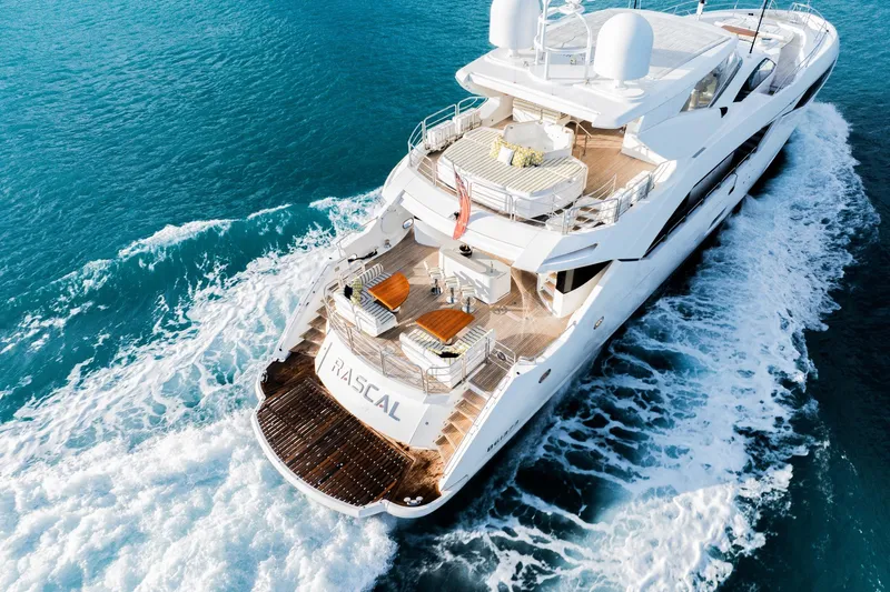 2015 Sunseeker 115' Sport Yacht Yacht Photos Pics Luxurious 2015 Sunseeker 115 Sport Yacht cruising on clear blue waters.