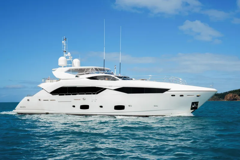 2015 Sunseeker 115' Sport Yacht Yacht Photos Pics 2015 Sunseeker 115 Sport Yacht cruising on blue ocean under clear sky.