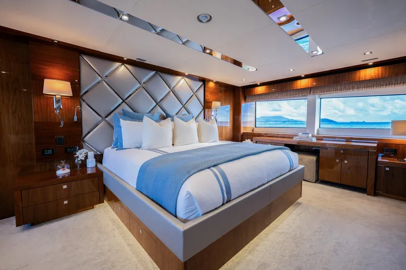 2015 Sunseeker 115' Sport Yacht Yacht Photos Pics Luxurious bedroom interior of 2015 Sunseeker 115 Sport Yacht with ocean view.